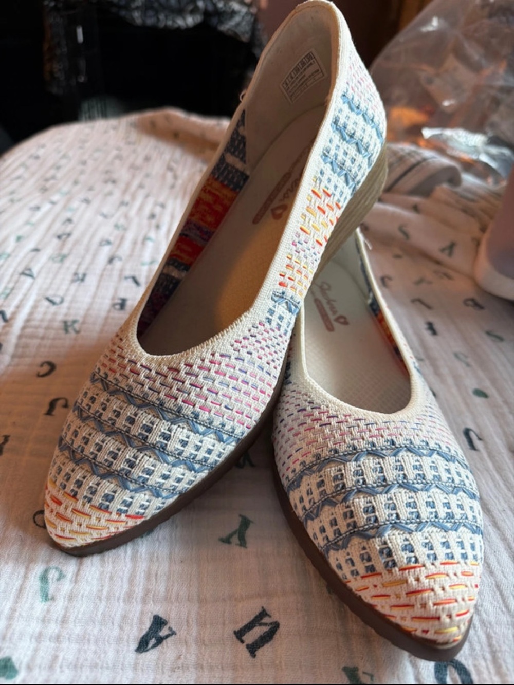Skechers Cream Woven Pointed-Toe Flats with Blue and Orange Accents